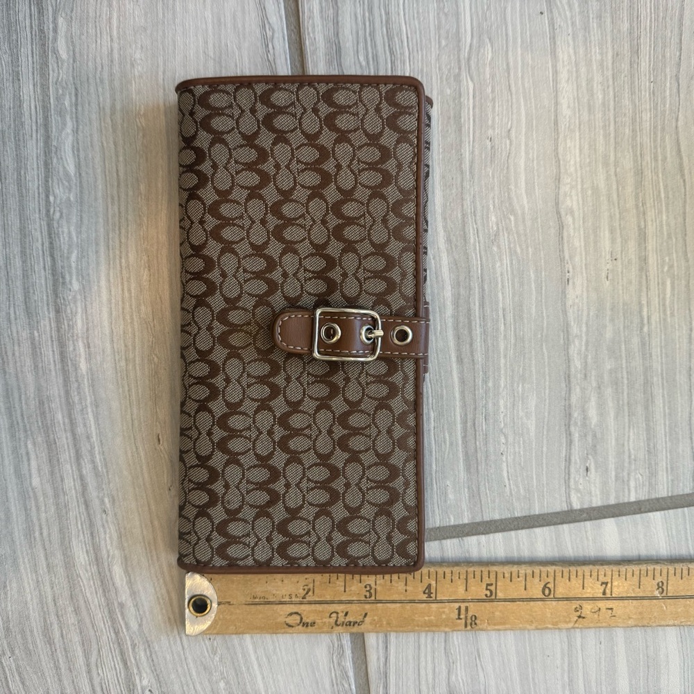 Coach wallet brown buckle slightly detached but still buckles as pictured
